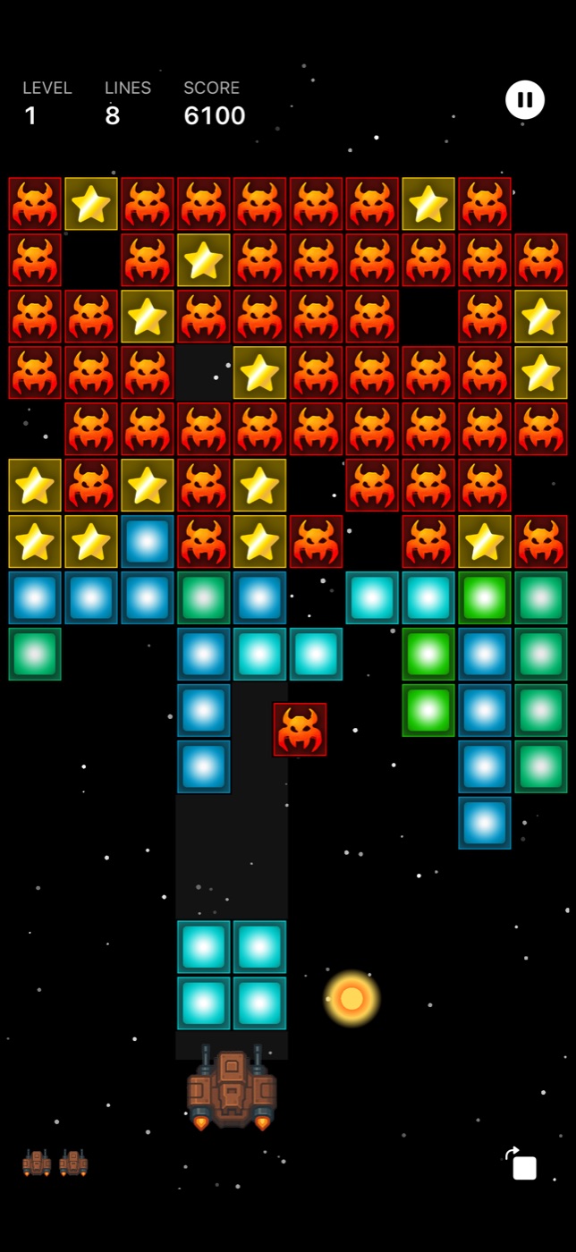 BlockBlaster gameplay with a dense board of enemy blocks, stars, and colored player blocks.